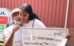 Angel Reese Donates to former school