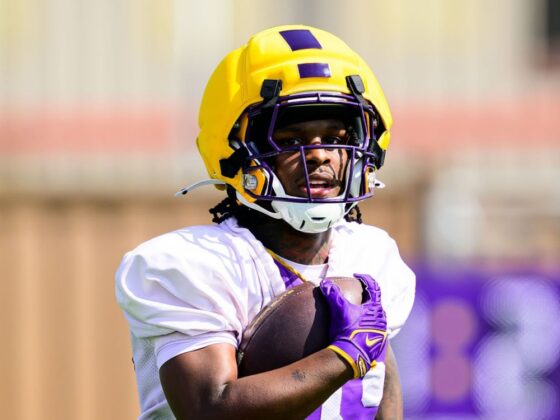 Toosii playing college football with Louisiana State University
